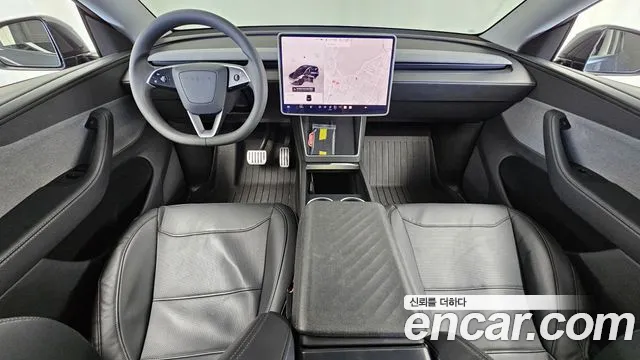 Tesla Model Y — Фото автомобиля 7