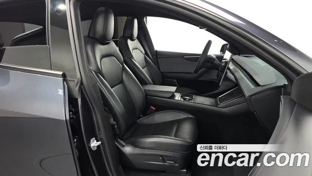 Tesla Model Y — Фото автомобиля 11