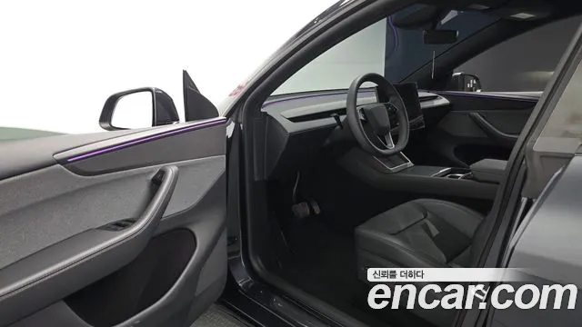 Tesla Model Y — Фото автомобиля 15