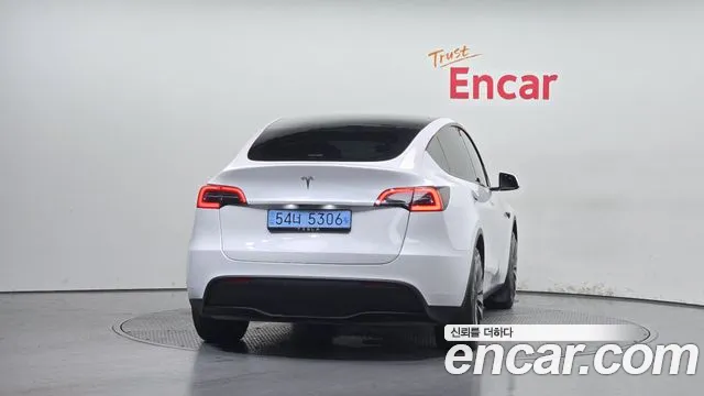 Tesla Model Y — Фото автомобиля 4