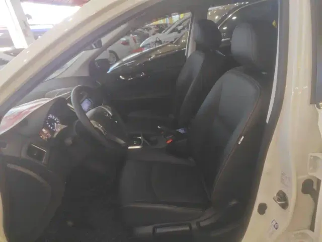 Nissan Tiida — Фото автомобиля 14