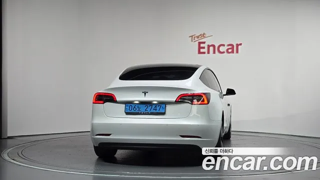 Tesla Model 3 — Фото автомобиля 4