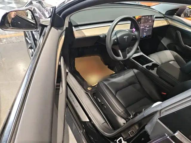 Tesla Model 3 — Фото автомобиля 15