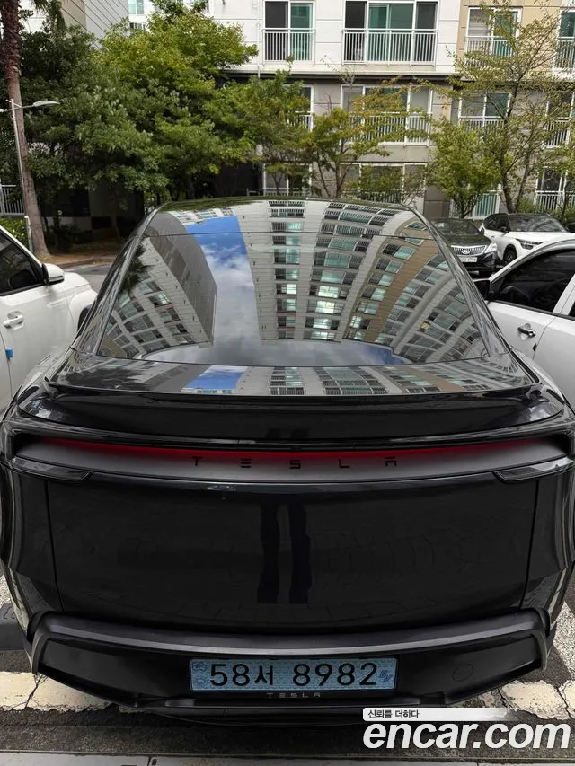 Tesla Model Y — Фото автомобиля 4