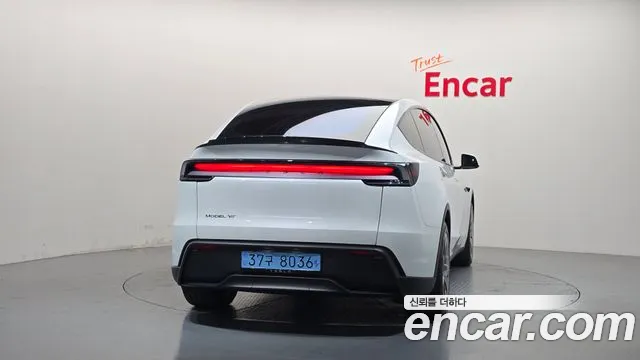 Tesla Model Y — Фото автомобиля 4