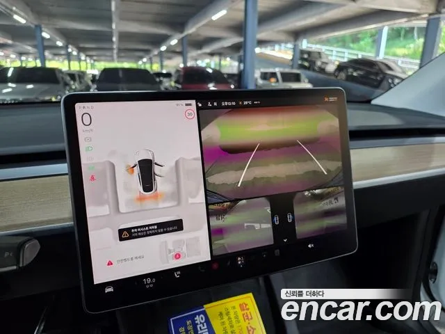 Tesla Model Y — Фото автомобиля 17