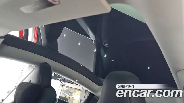 Tesla Model Y — Фото автомобиля 23