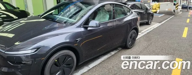 Tesla Model Y — Фото автомобиля 3