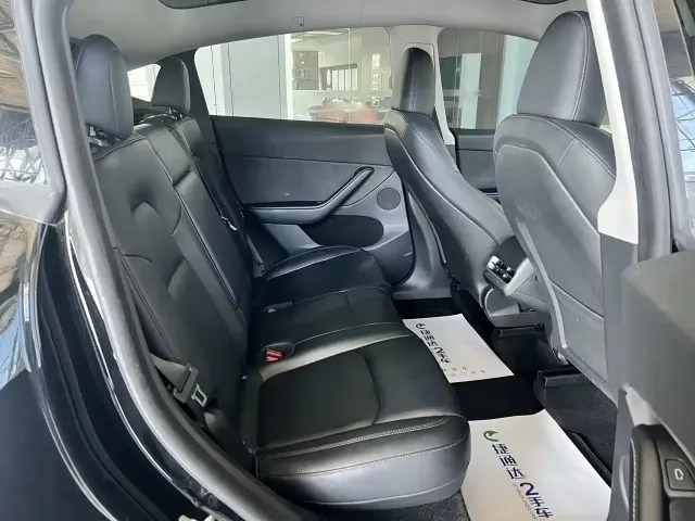 Tesla Model Y — Фото автомобиля 7
