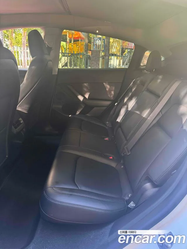 Tesla Model Y — Фото автомобиля 11