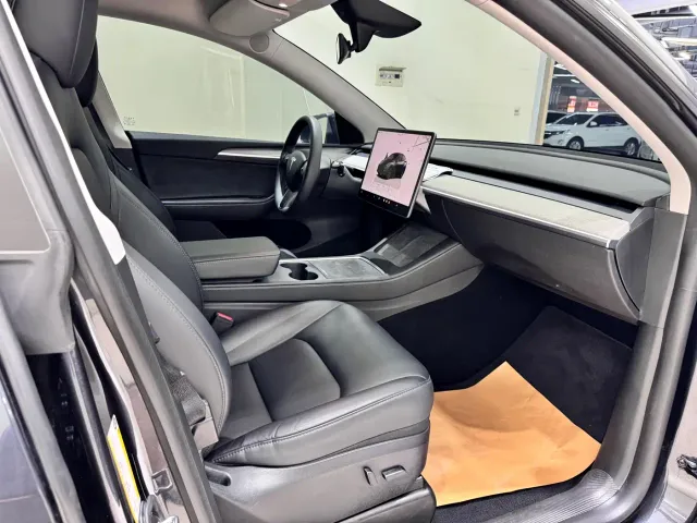 Tesla Model Y — Фото автомобиля 7