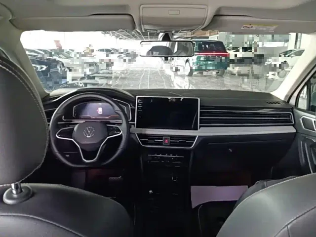 Volkswagen Tiguan L — Фото автомобиля 9