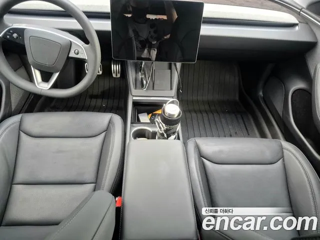 Tesla Model 3 — Фото автомобиля 11