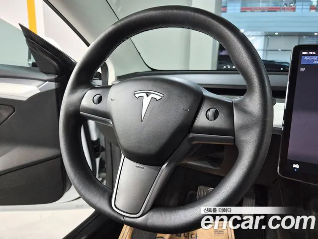Tesla Model 3 — Фото автомобиля 14