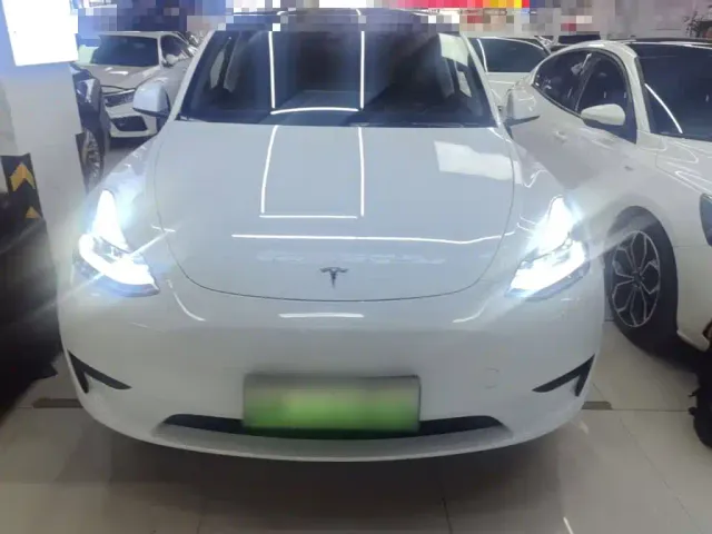Tesla Model Y 2024 Rear-Wheel Drive Version — Фото автомобиля 2