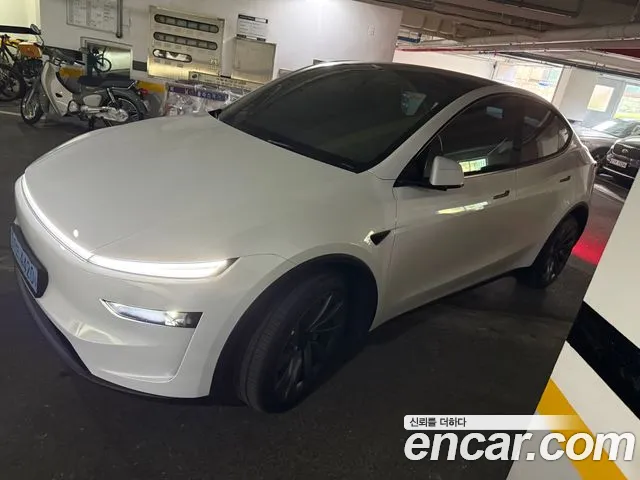 Tesla Model Y — Фото автомобиля 3