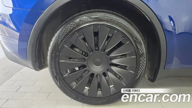 Tesla Model Y — Фото автомобиля 5