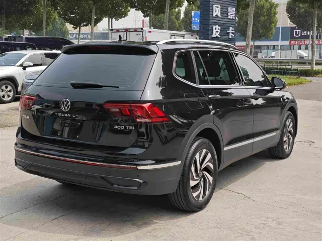 Volkswagen Tiguan L — Фото автомобиля 4