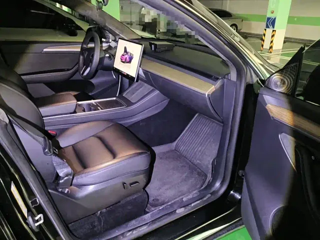 Tesla Model Y — Фото автомобиля 12