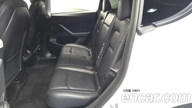 Tesla Model Y — Фото автомобиля 3