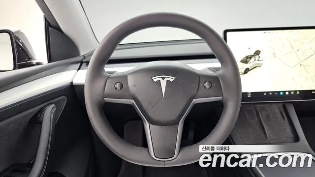 Tesla Model Y — Фото автомобиля 13