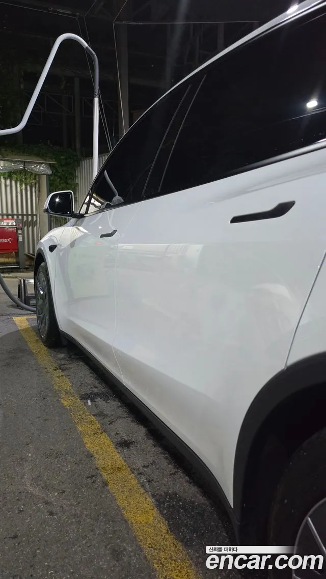 Tesla Model Y — Фото автомобиля 6