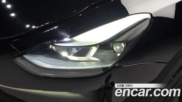 Tesla Model Y — Фото автомобиля 7