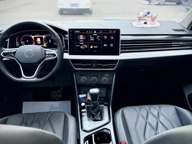Volkswagen Tiguan L — Фото автомобиля 21