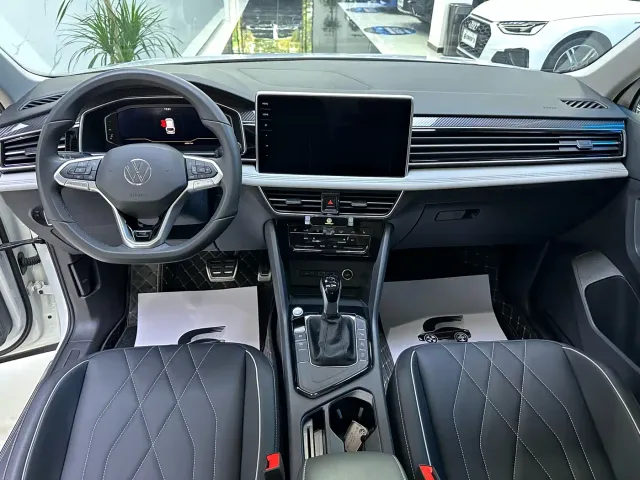 Volkswagen Tiguan L — Фото автомобиля 5