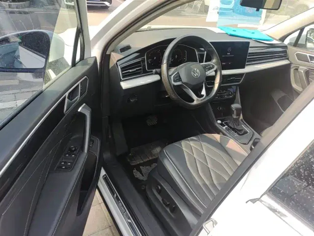 Volkswagen Tiguan L — Фото автомобиля 15