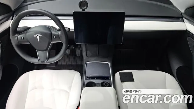 Tesla Model Y — Фото автомобиля 7