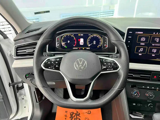 Volkswagen Tiguan L — Фото автомобиля 12