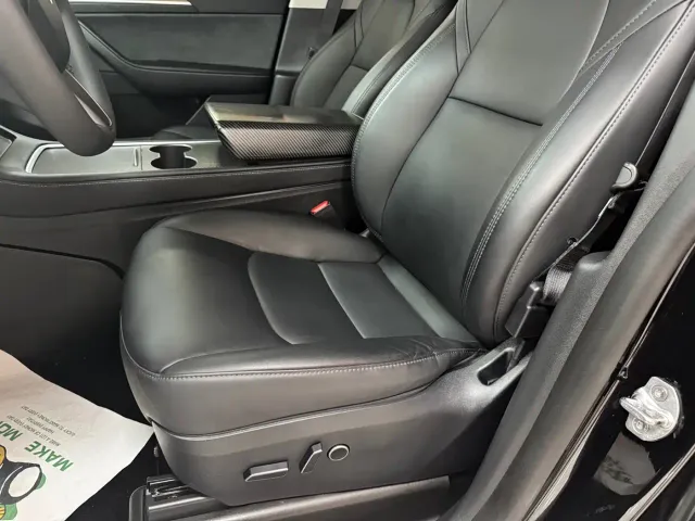 Tesla Model Y — Фото автомобиля 12