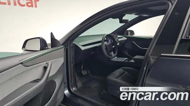 Tesla Model Y — Фото автомобиля 10