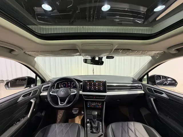 Volkswagen Tiguan L — Фото автомобиля 11