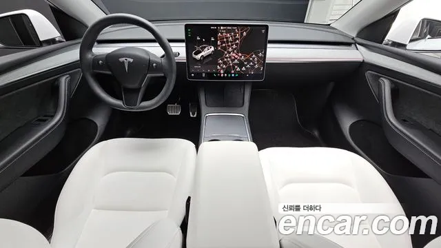 Tesla Model Y — Фото автомобиля 9