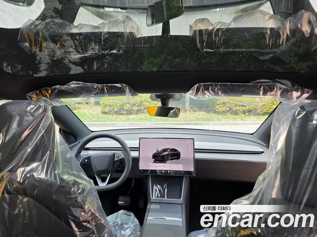 Tesla Model Y — Фото автомобиля 8