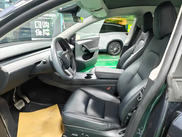 Tesla Model Y — Фото автомобиля 16