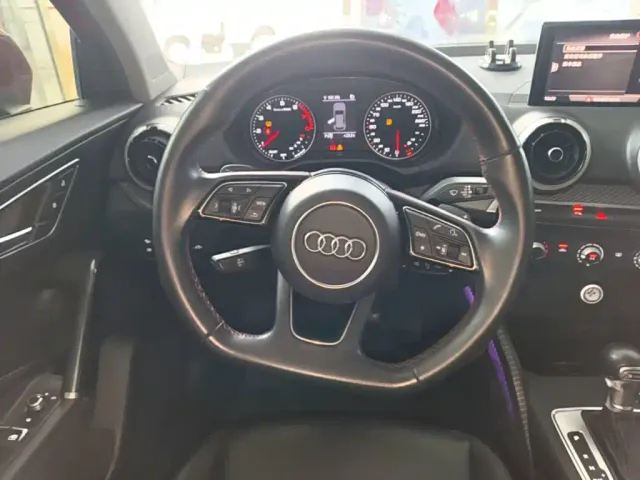 Audi Q2L — Фото автомобиля 10
