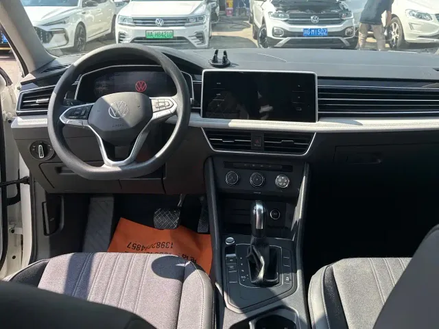 Volkswagen Tiguan L — Фото автомобиля 6