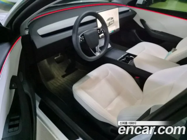 Tesla Model 3 — Фото автомобиля 7