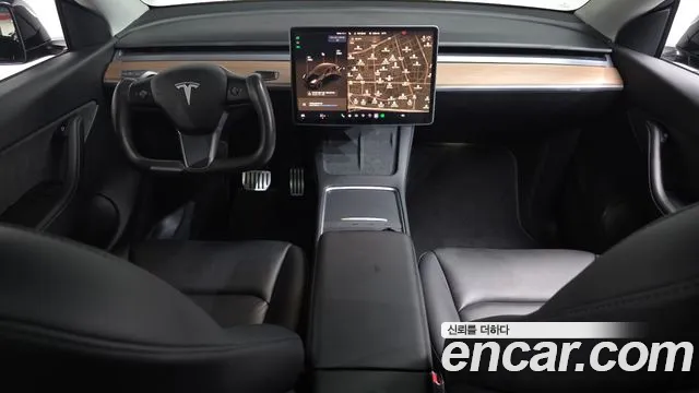 Tesla Model Y — Фото автомобиля 10