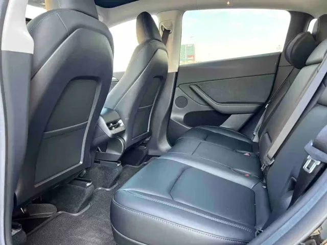Tesla Model Y — Фото автомобиля 22