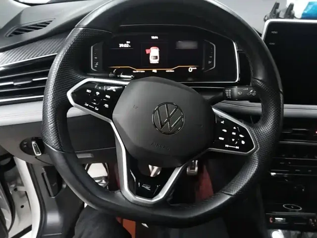 Volkswagen Tiguan X — Фото автомобиля 10