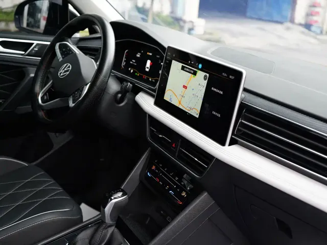 Volkswagen Tiguan L — Фото автомобиля 12