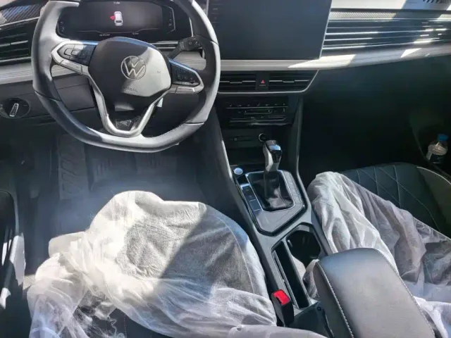 Volkswagen Tiguan L — Фото автомобиля 12