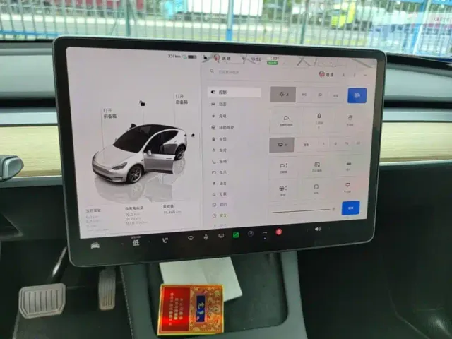 Tesla Model Y — Фото автомобиля 12