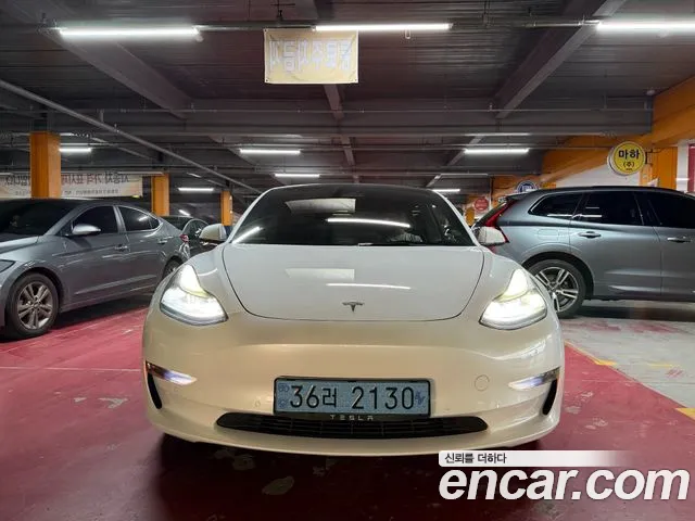 Tesla Model 3 — Фото автомобиля 2