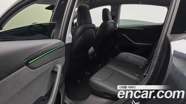 Tesla Model Y — Фото автомобиля 16