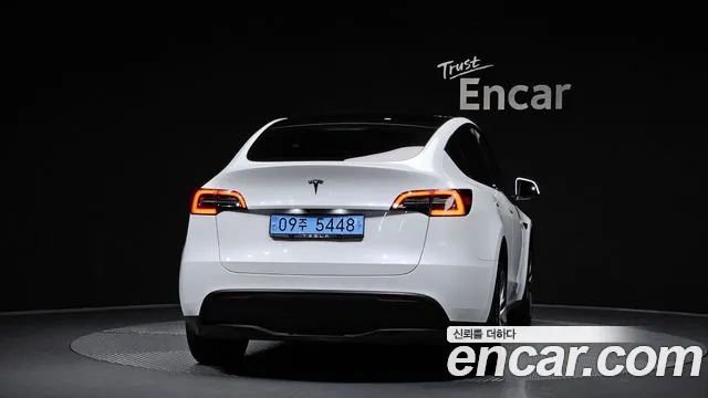 Tesla Model Y — Фото автомобиля 4